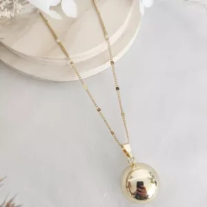 Bola de grossesse dorée